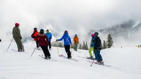 ski instructor with group of ski students